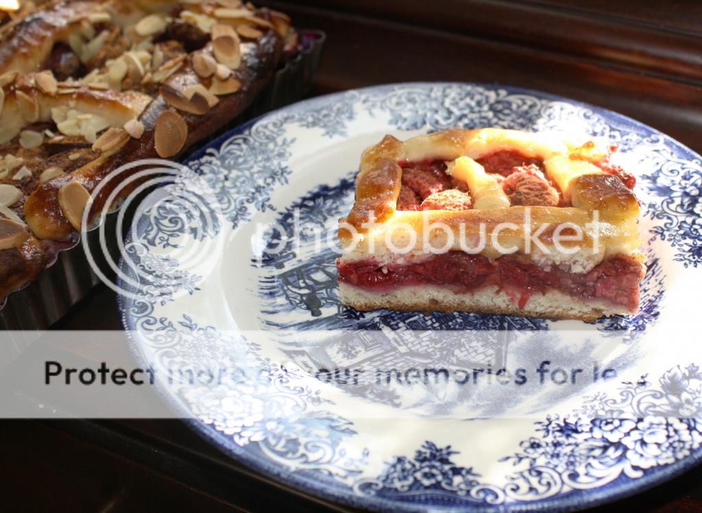 photo Open-facedpiesraspberrypieplumpiewithslicedalmondsyeastdough_zpsd1d50834.jpg